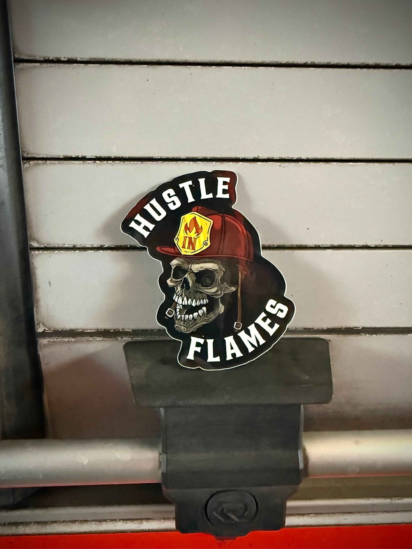 Hustle in Flames Sticker